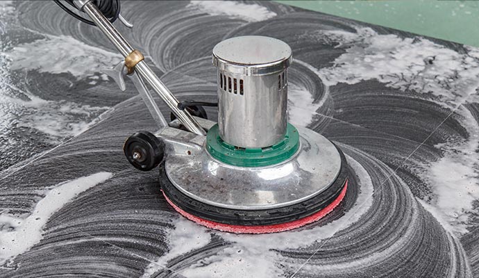 Professional floor cleaning service with specialized equipment