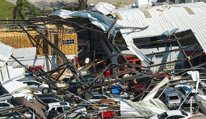 Disaster damaged commercial area with debris and structural impact