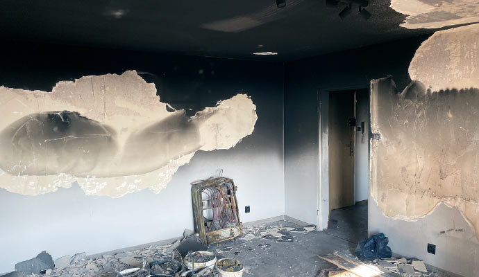 A room severely damaged by fire