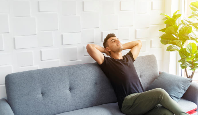 A person sitting on a sofa