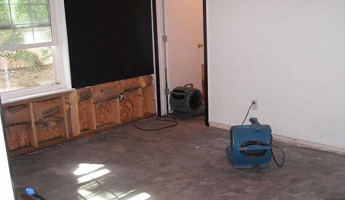 Using air mover for drying water